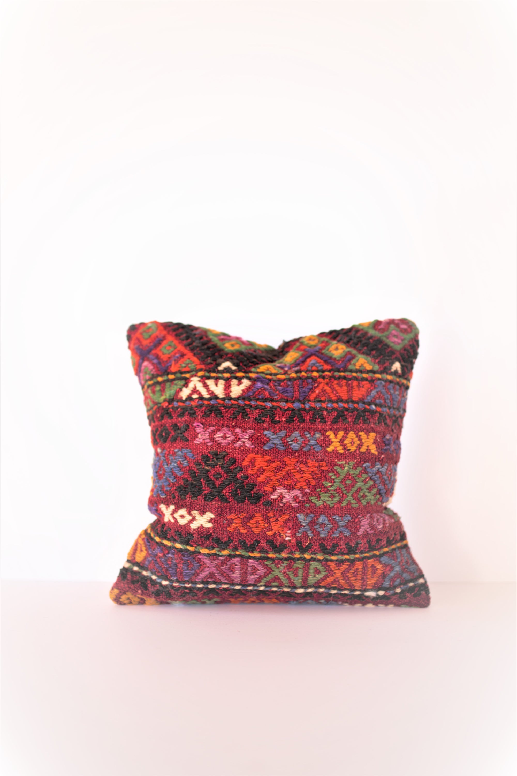 Kilim pillow; Decorative Turkish pillow; Wool pillow cushion; Bohemian fashion; Authentic hand woven pillow made of old Turkish rug; Killim cushion; Handmade pillow of vintage kilims; Vintage Anatolian kilim pillow; Wool on the front, cotton on the back pillow; Convenient zipper closure on pillow; Indoor Square cushion case; Fair-trade pillow; Ethically soured; Unique handmade; Hand-knotted